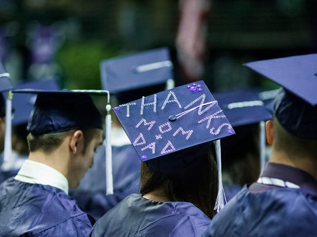 students in caps and gowns